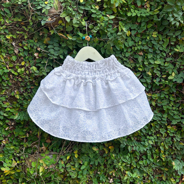 white embroidered fabric skirt