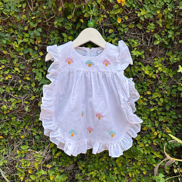 white floral apron dress