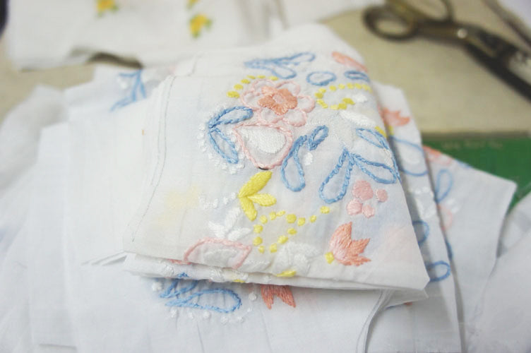 shadow work embroidery pattern on baby dress from Tara Cochin Kerala